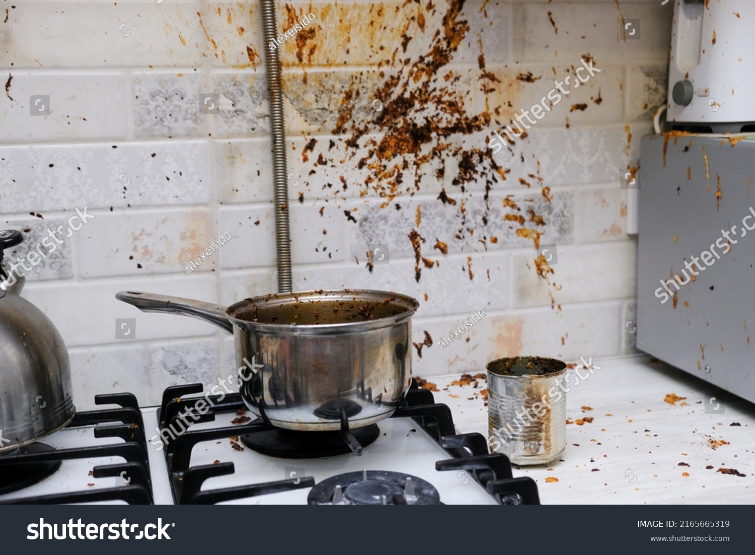 Oil stains on the walls, dirty stains on kitchen wall, Dirty Cooking. forgot to turn off the gas stove, condensed milk explosion #2165665319