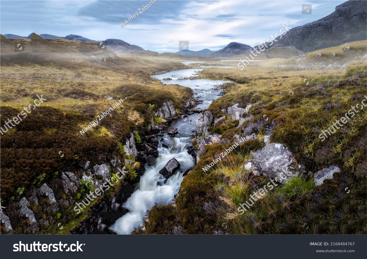 A river in a mountain valley. River valley in mountains. River valley landscape. River valley panorama #2168484767