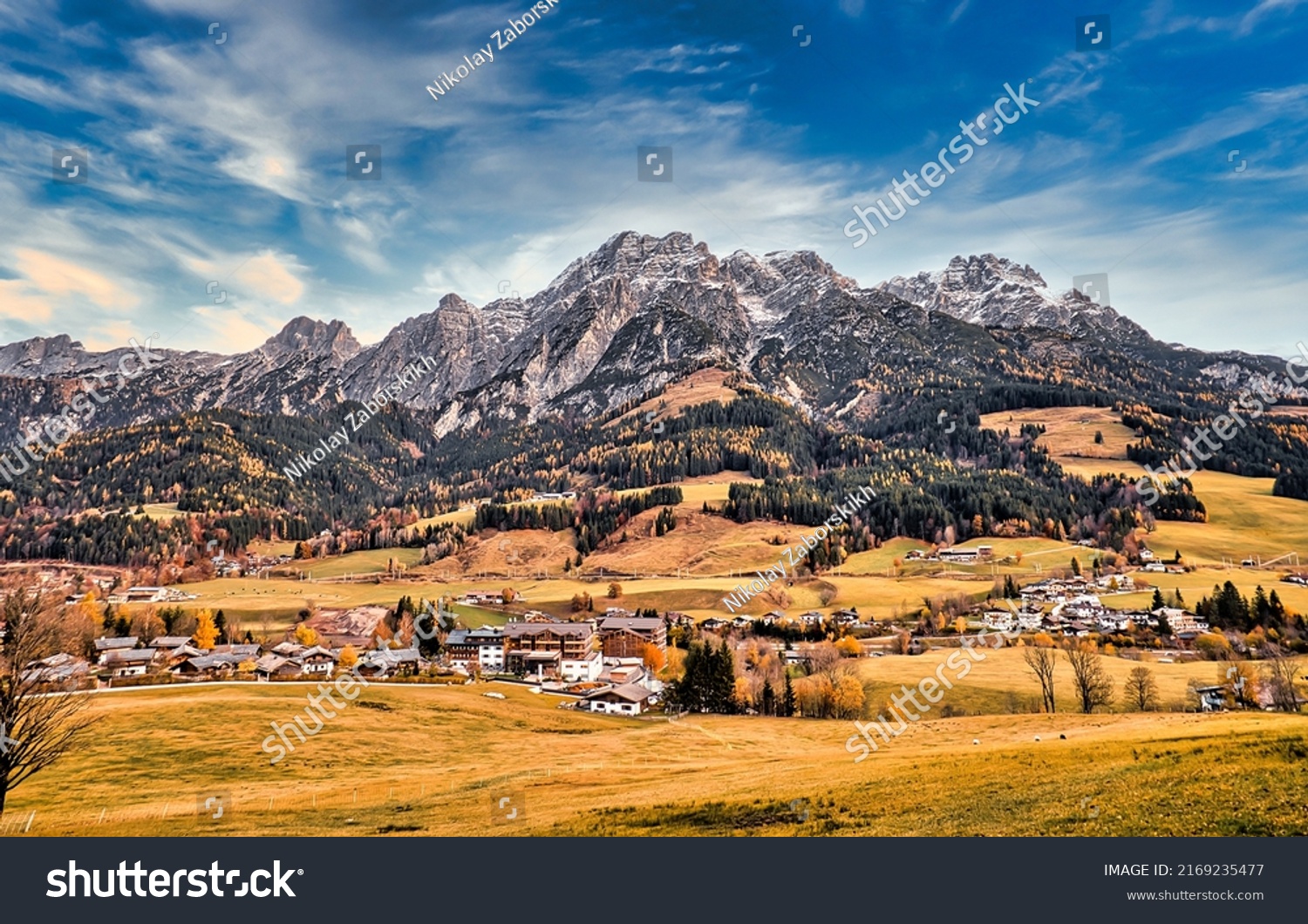 Mountain village in a mountain valley. Mountain village landscape. Village in mountains #2169235477