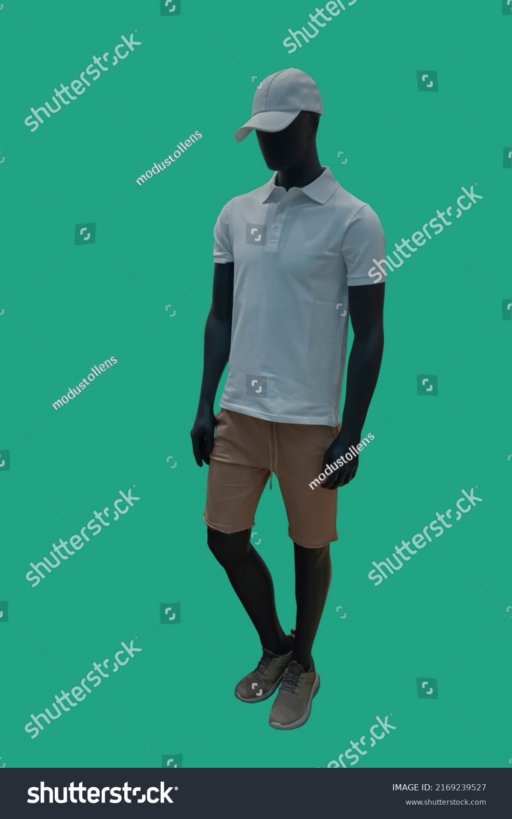 Full length image of a male display mannequin wearing fashionable summer clothes isolated on blue background #2169239527