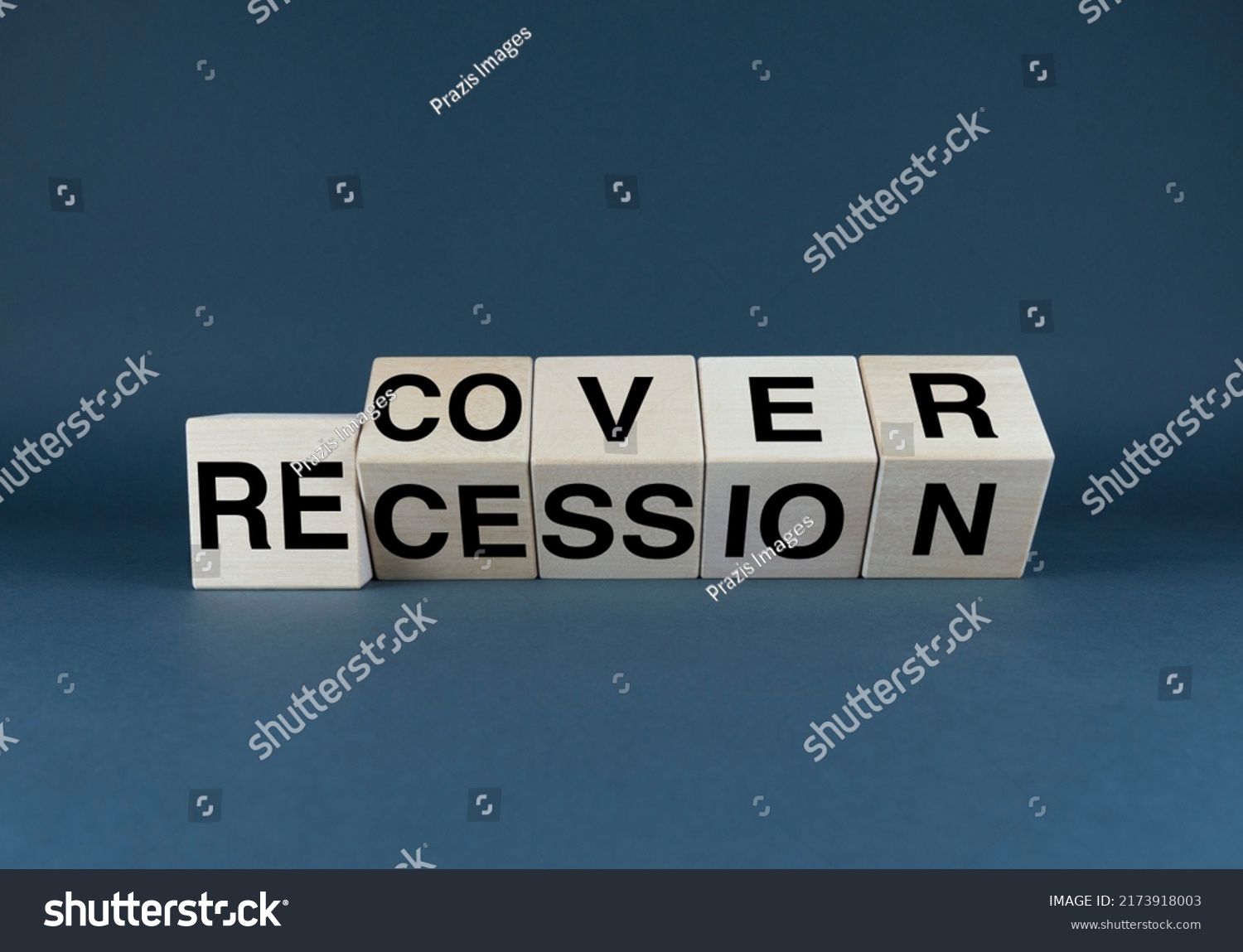 Recovery or recession. The cubes form the words Recover or Recession. A broad concept in both business and medicine #2173918003