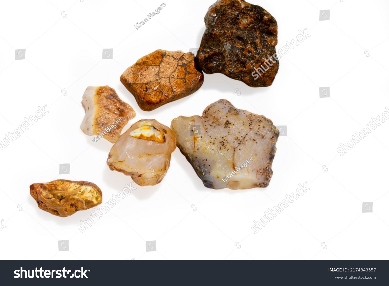 Colorful collection of small river stones on white background, River stones background. #2174843557