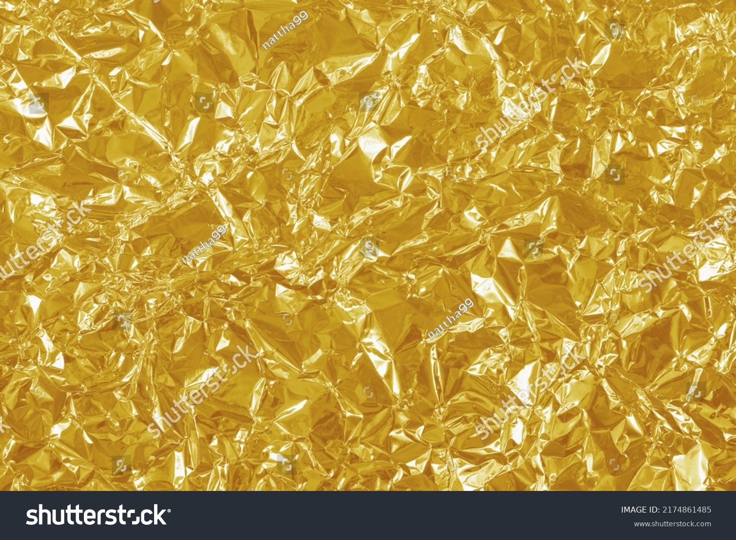 Gold foil leaf shiny texture, abstract yellow wrapping paper for background and design art work. #2174861485