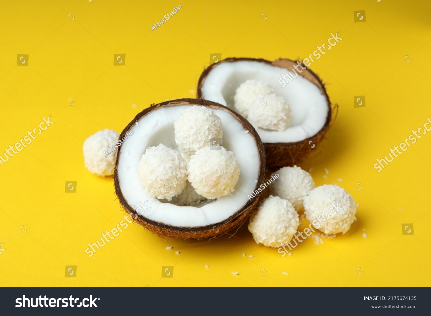 Concept of tasty sweets on yellow background, coconut candies #2175674135