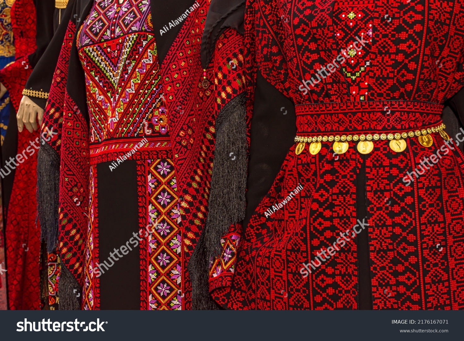 Closeup to beaded dress, traditional dress of Palestine and Jordan, handmade fashion style #2176167071