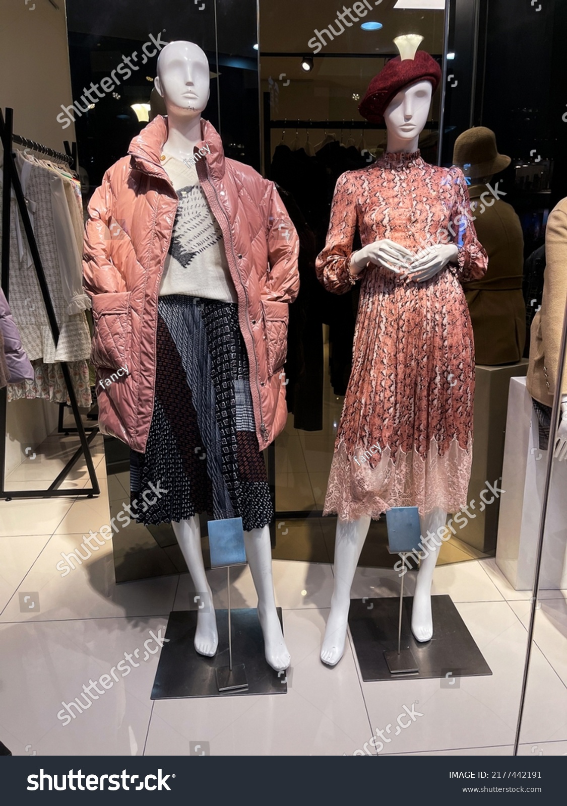 Woman clothes displayed on mannequin dummy in clothing shop

 #2177442191