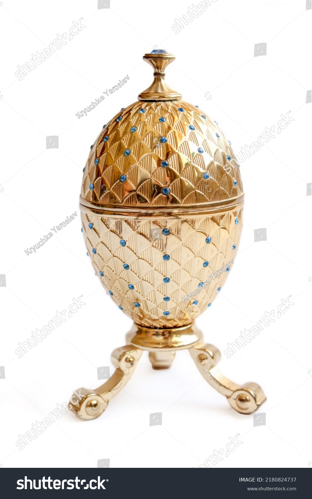 Luxury item - precious jewelry golden Faberge eggs. Decorative ceramic easter egg for jewellery. Egg isolated on white background #2180824737