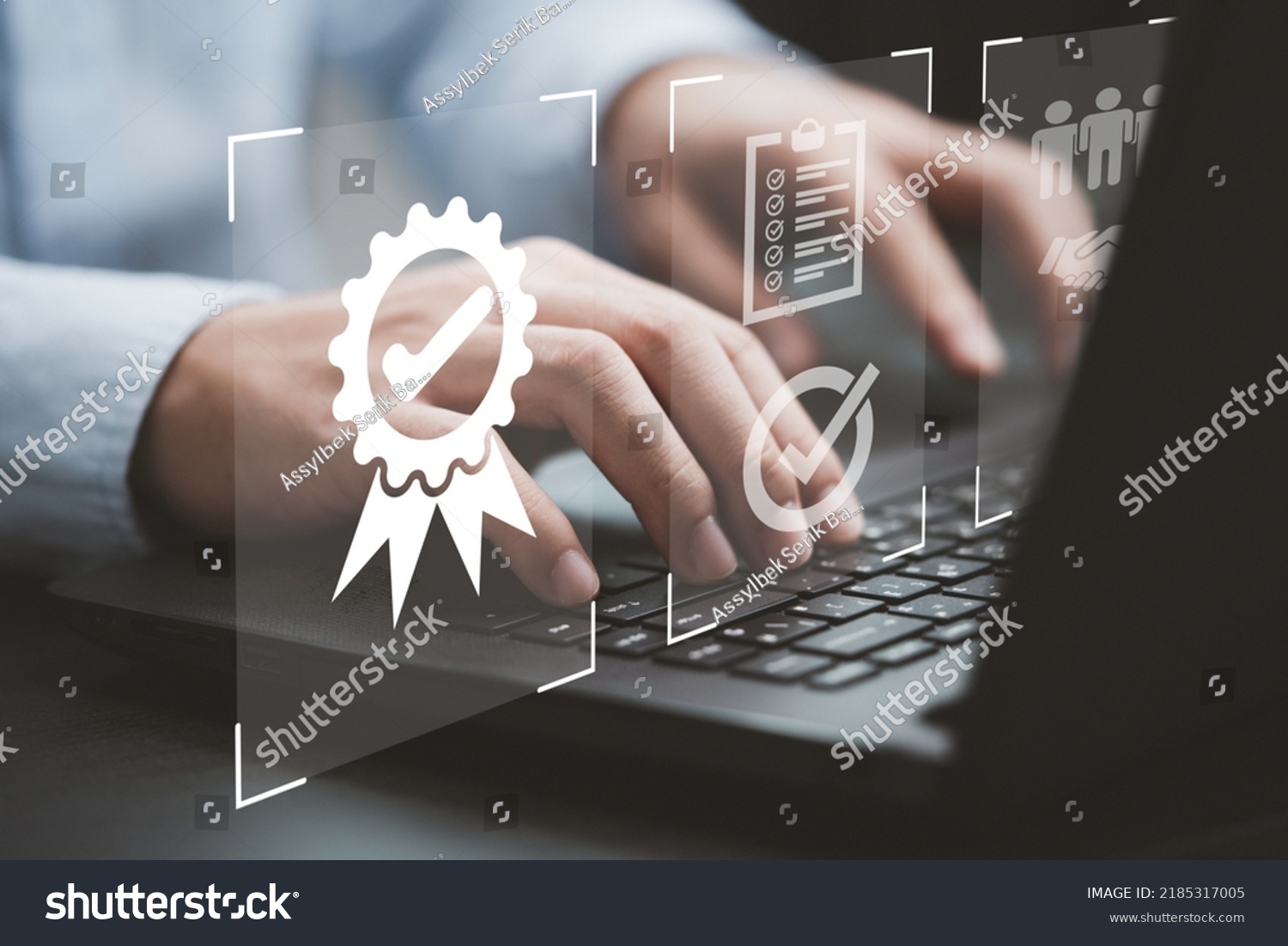 Businessman using laptop computer with quality assurance and document icon for ISO or International Standard Organisation which related quality control and continuous improvement concept. #2185317005