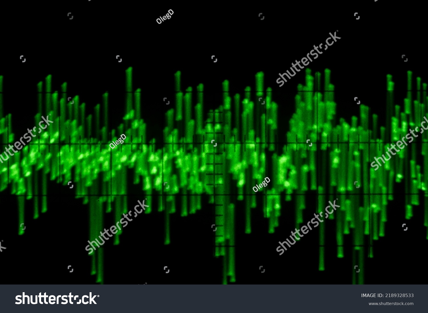 Audio signal on oscilloscope screen. Communication and electronics. Close up, blurred focus #2189328533