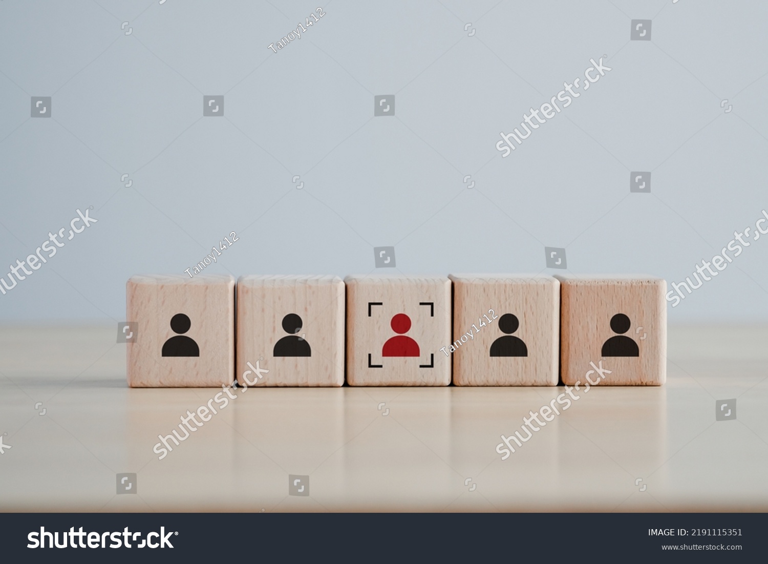 Business hiring and recruitment selection. Career opportunity. Human Resource Management. Focus red human icon on wooden block. Choice of employee leader from the crowd. #2191115351