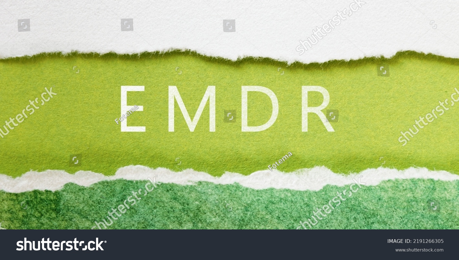 Eye Movement Desensitization and Reprocessing psychotherapy treatment concept. Letters EMDR written on a green torn paper. #2191266305