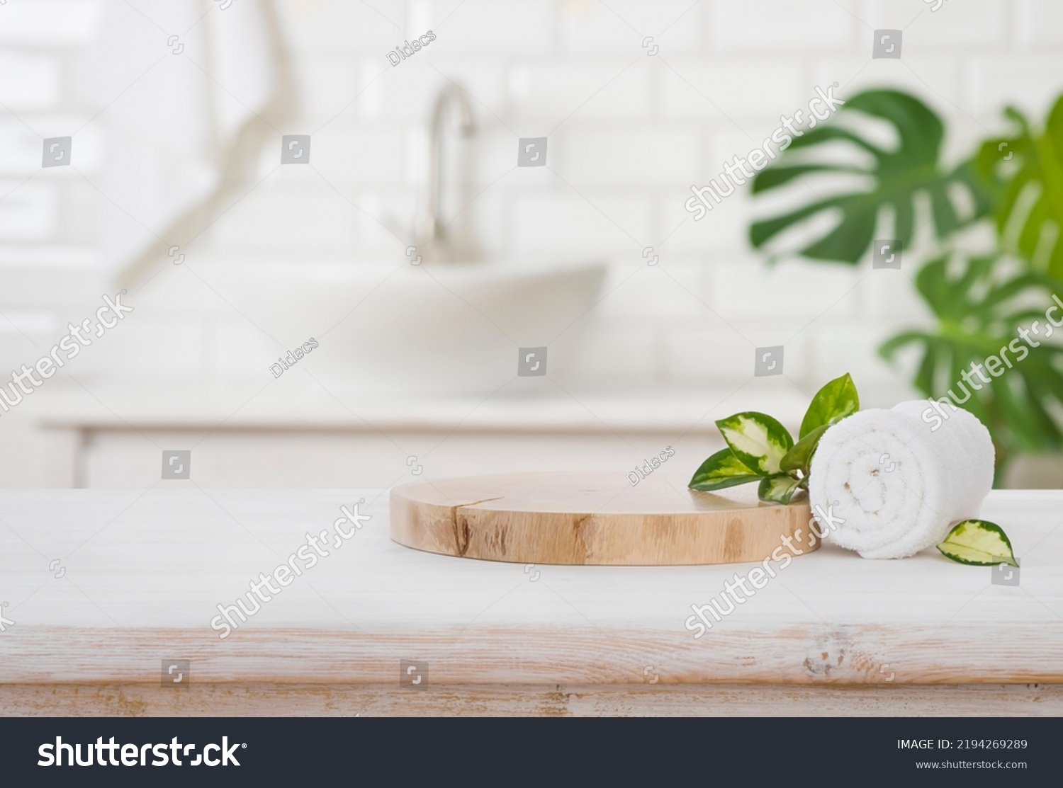 Podium for product display and towel on blurred bathroom background #2194269289