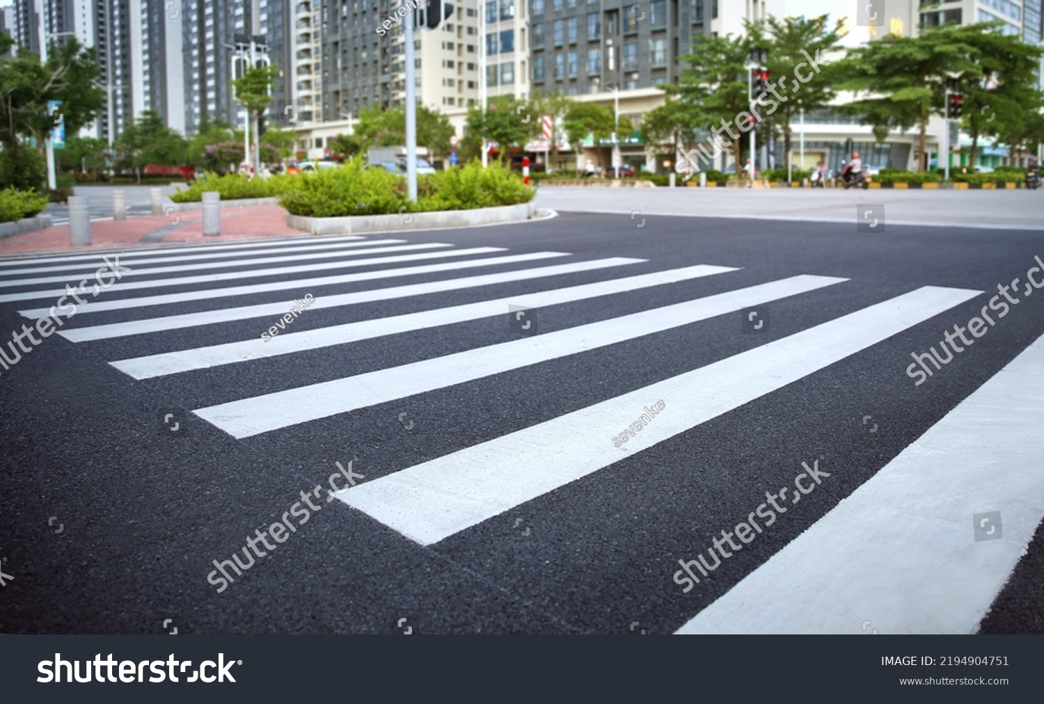 pedestrian crossing, white stripes on black asphalt, road markings zebra crossing, place to cross the road, traffic rules #2194904751
