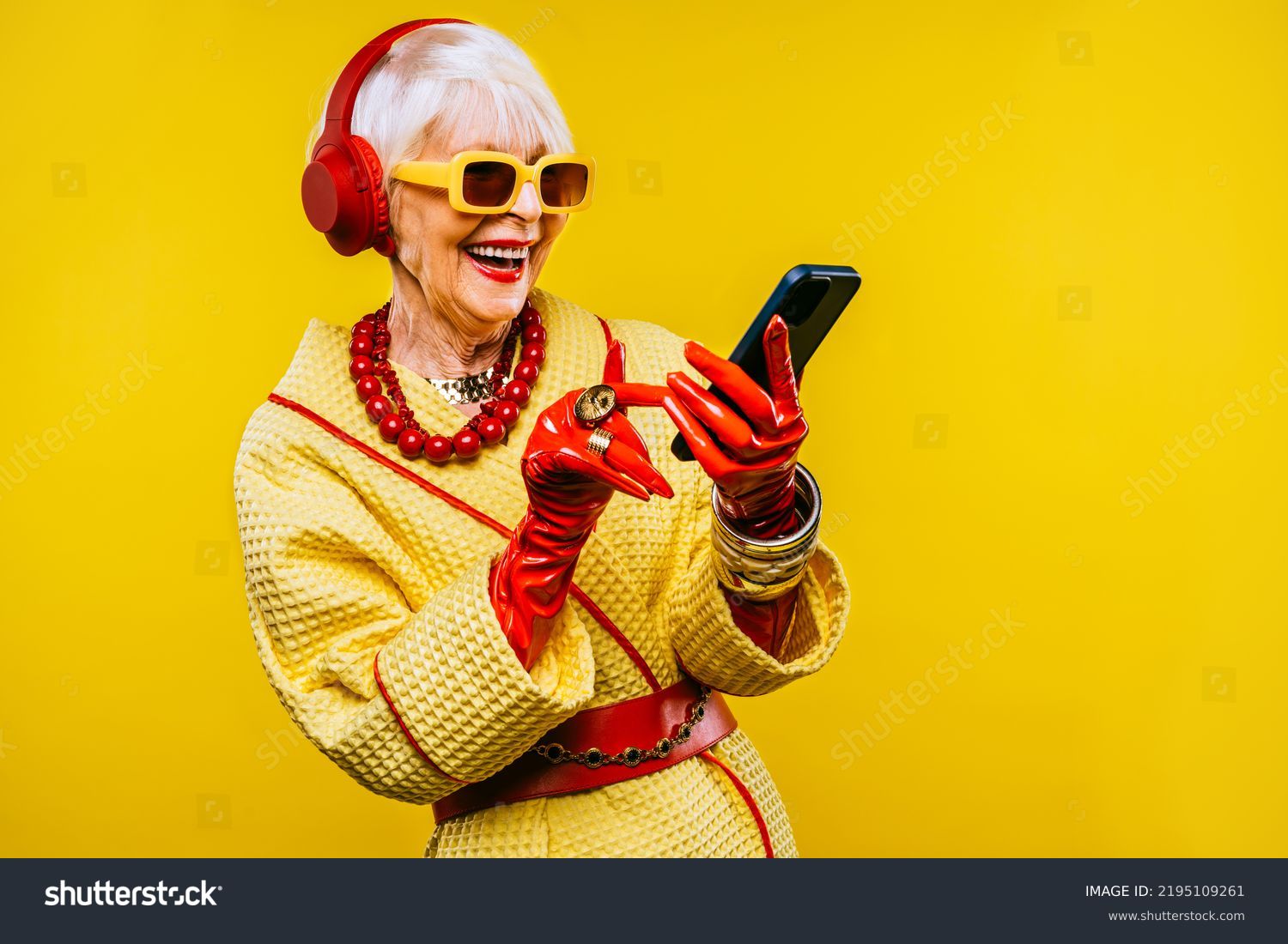Happy and funny cool old lady with fashionable clothes portrait on colored background - Youthful grandmother with extravagant style, concepts about lifestyle, seniority and elderly people #2195109261