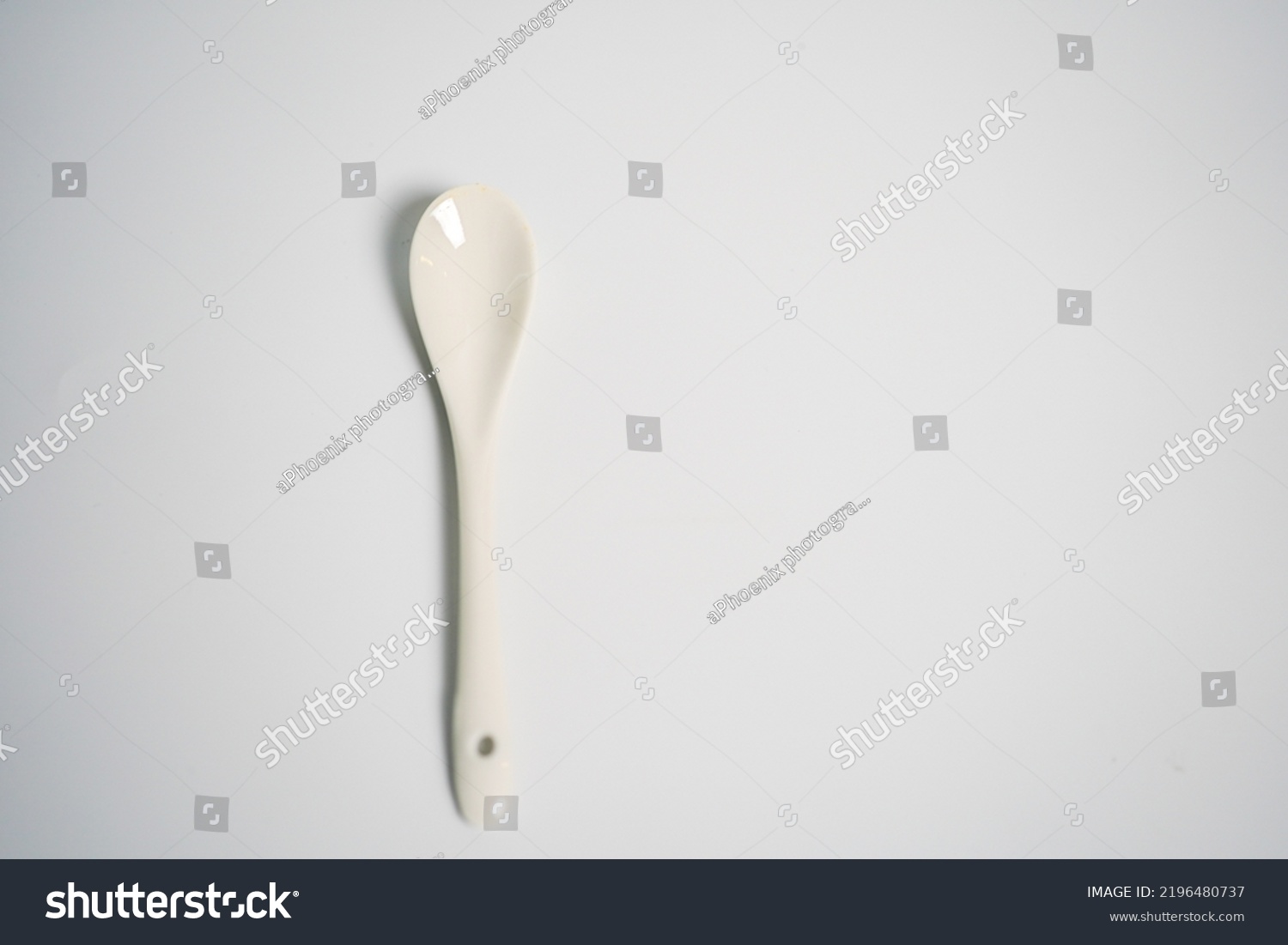 white ceramic spoon set isolate on white background #2196480737