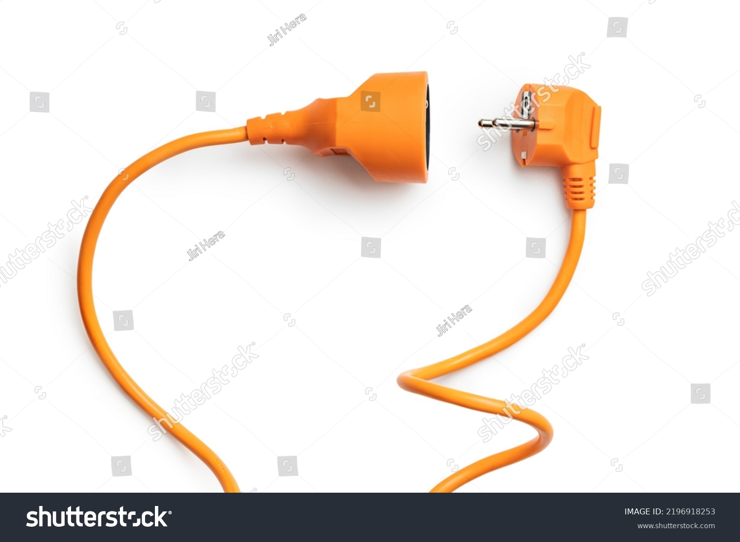 Disconnected orange electric plug and socket isolated on the white background. #2196918253