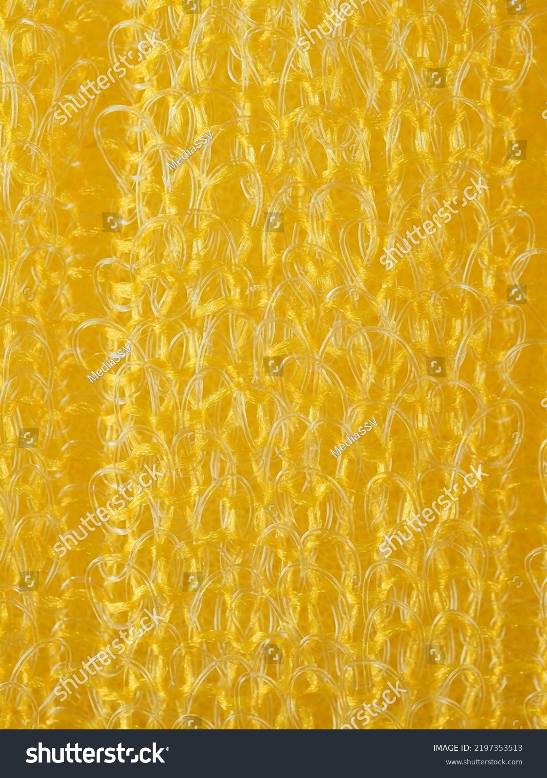 close up, background, texture, large vertical banner. heterogeneous surface structure bright saturated yellow sponge for washing dishes, kitchen, bath. full depth of field. high resolution photo #2197353513