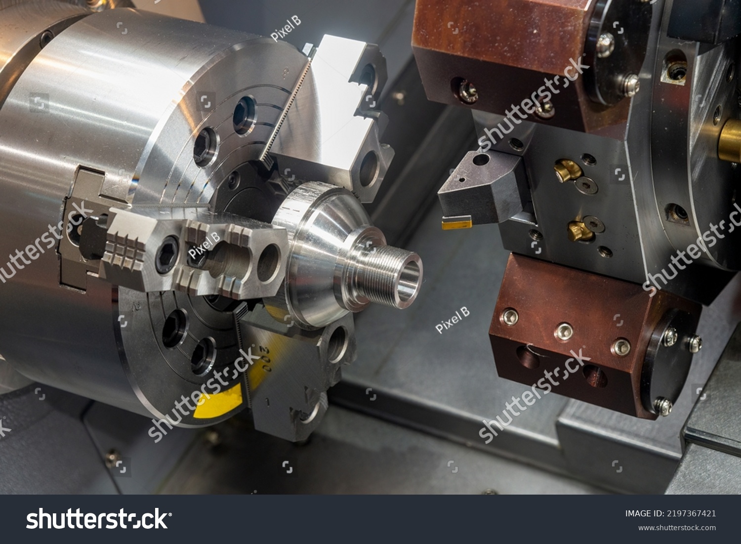The  CNC lathe machine forming  cutting the metal shaft parts. The hi-technology metal working processing by CNC turning machine . #2197367421