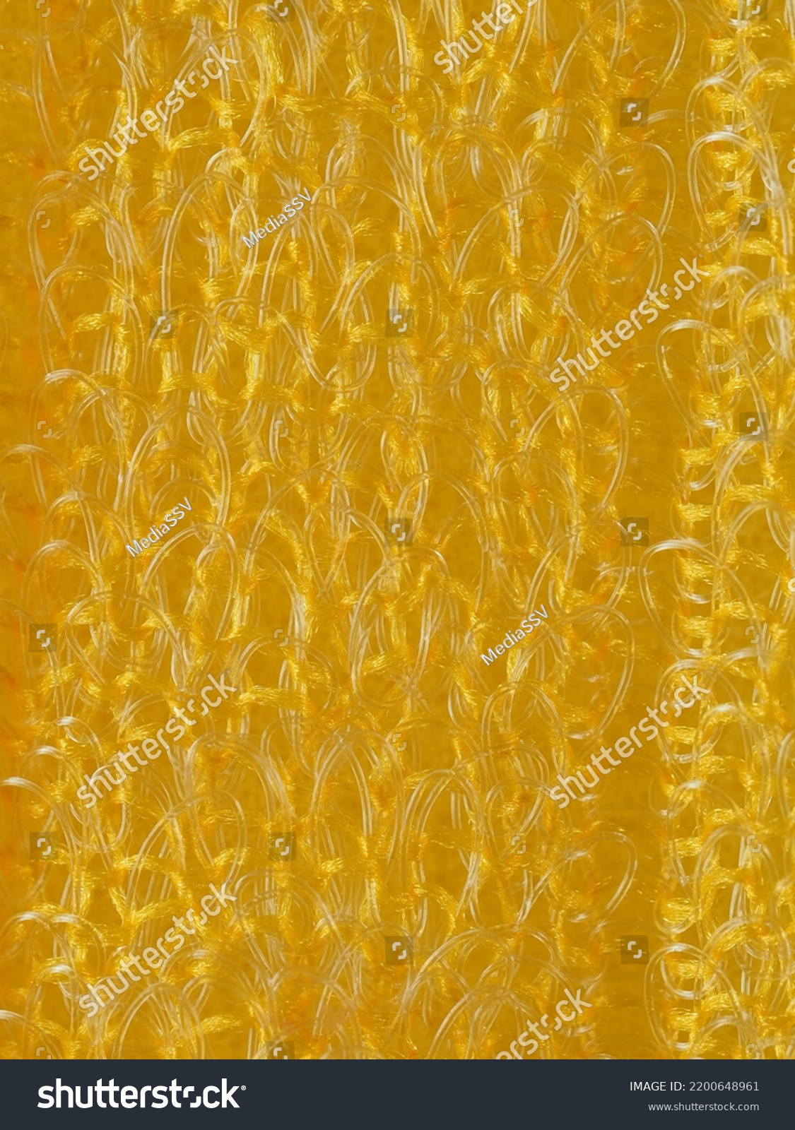 close up, background, texture, large vertical banner. heterogeneous surface structure bright saturated yellow sponge for washing dishes, kitchen, bath. full depth of field. high resolution photo #2200648961