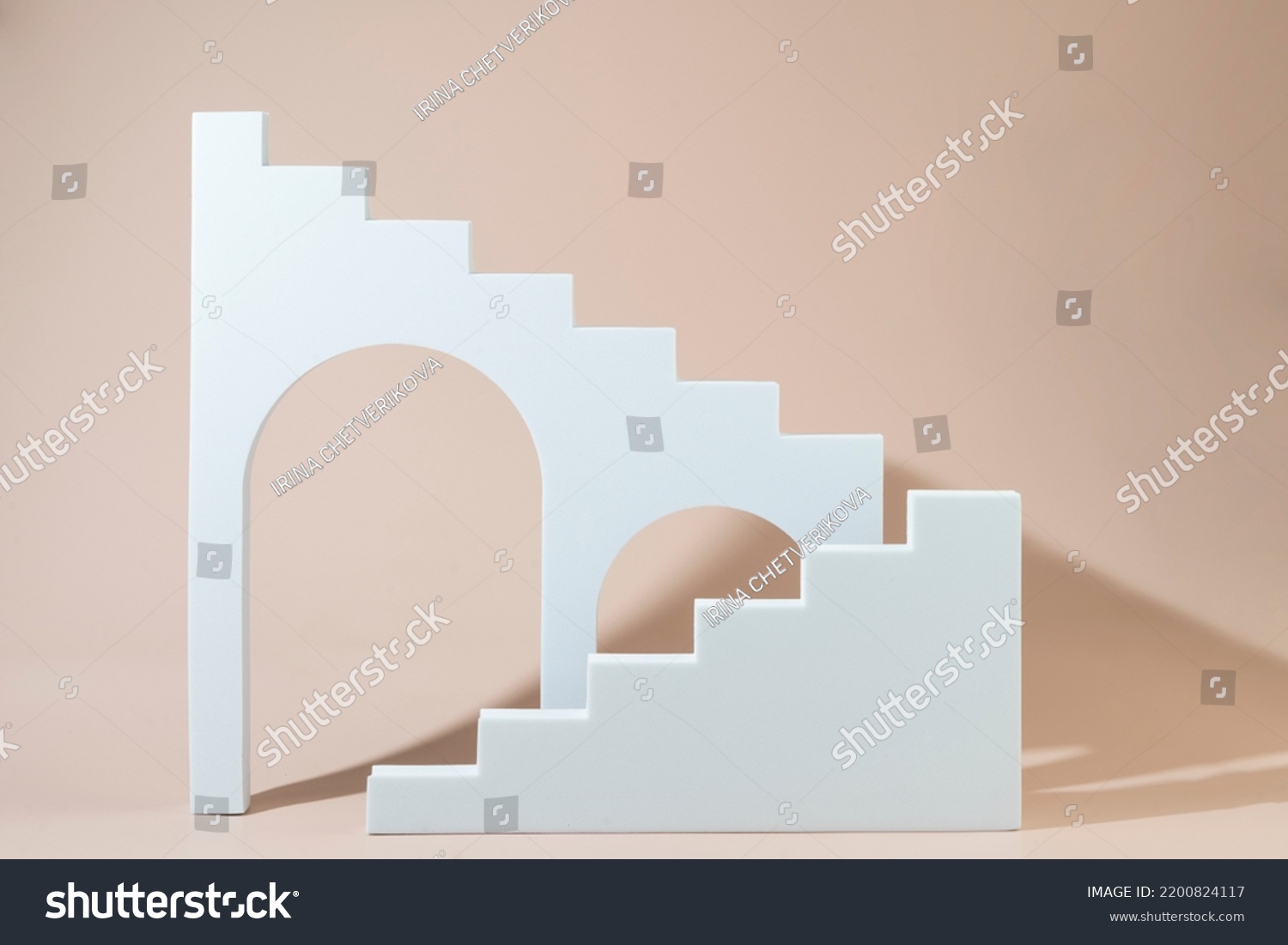 Geometric shapes stairs podiums and archs standing on a beige background #2200824117