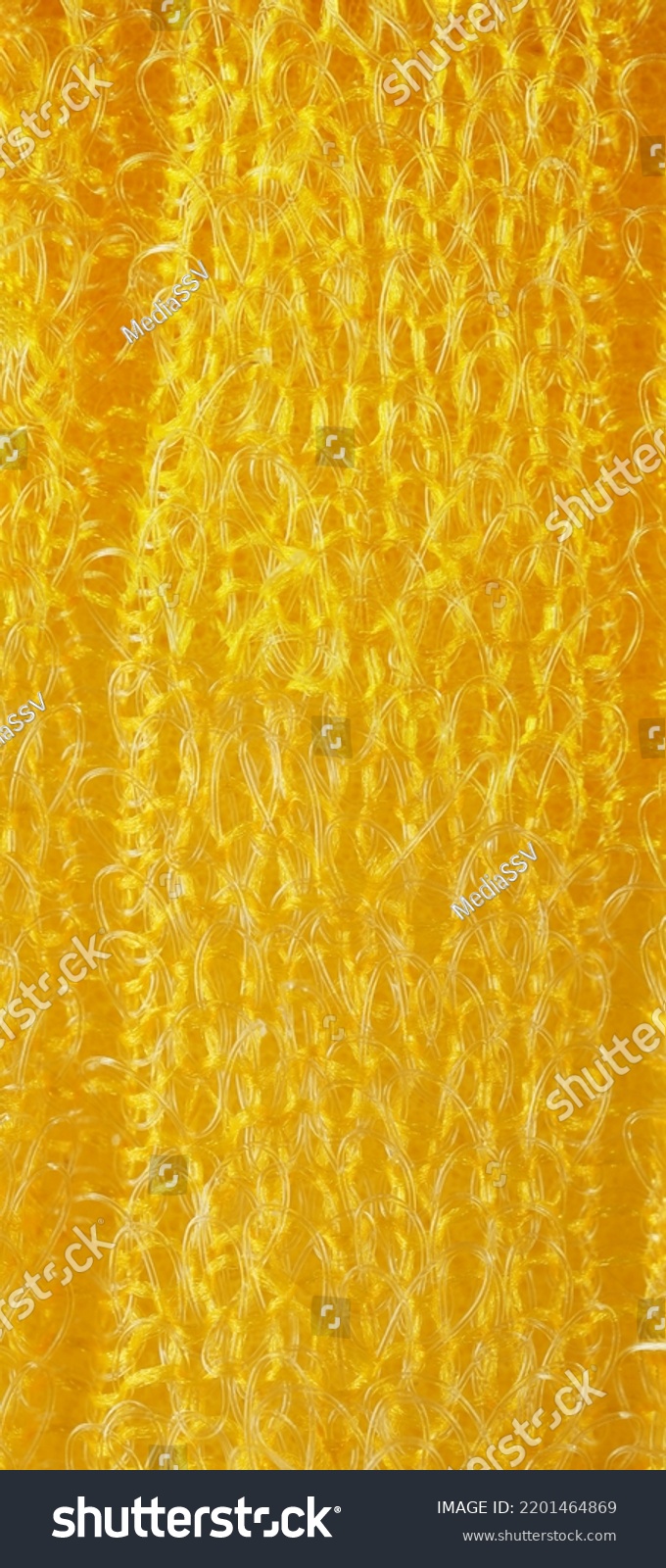 closeup, background, texture, large long vertical banner. heterogeneous surface structure bright saturated yellow sponge for washing dishes, kitchen, bath. full depth of field. high resolution photo #2201464869