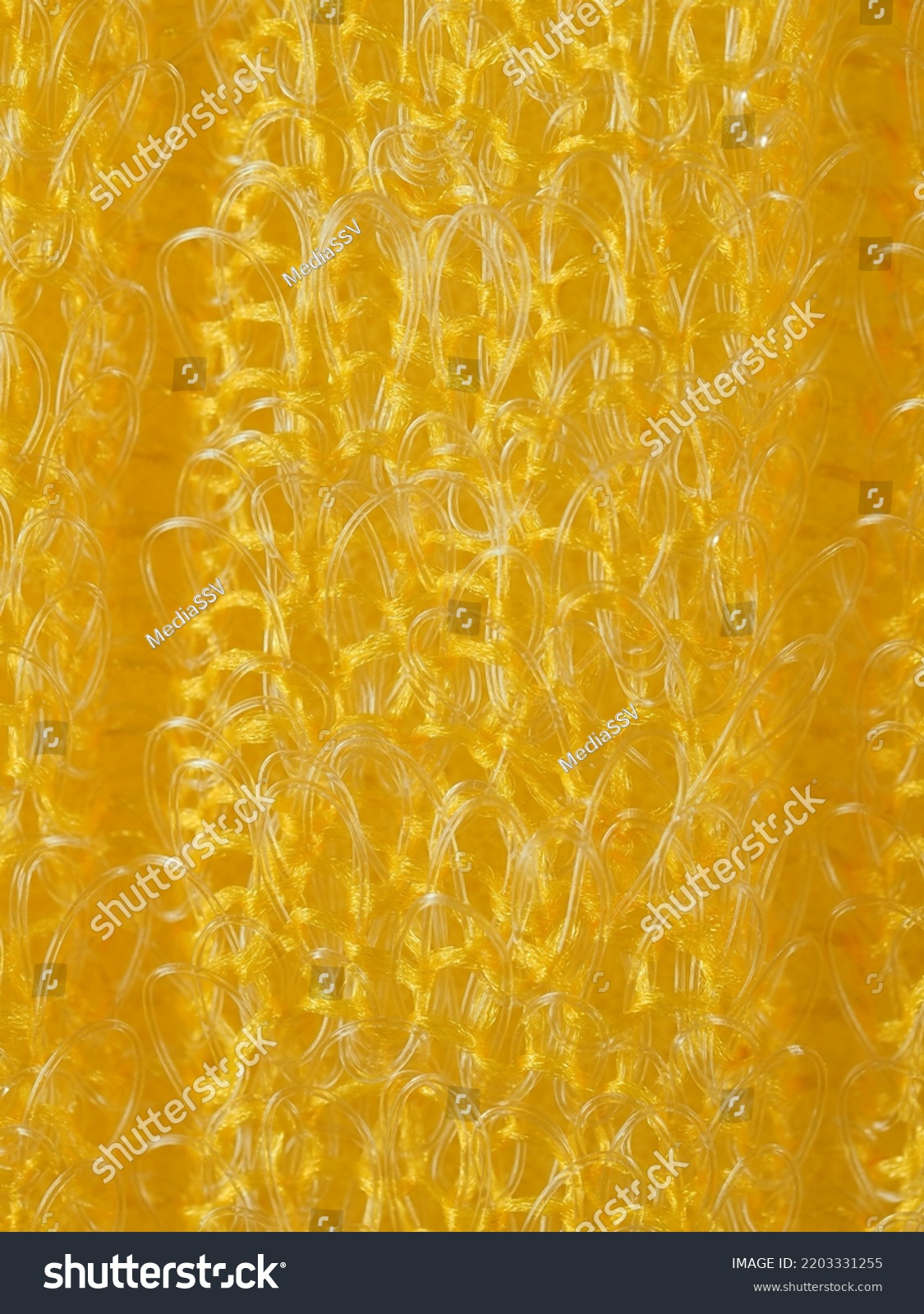 close up, background, texture, large vertical banner. heterogeneous surface structure bright saturated yellow sponge for washing dishes, kitchen, bath. full depth of field. high resolution photo #2203331255