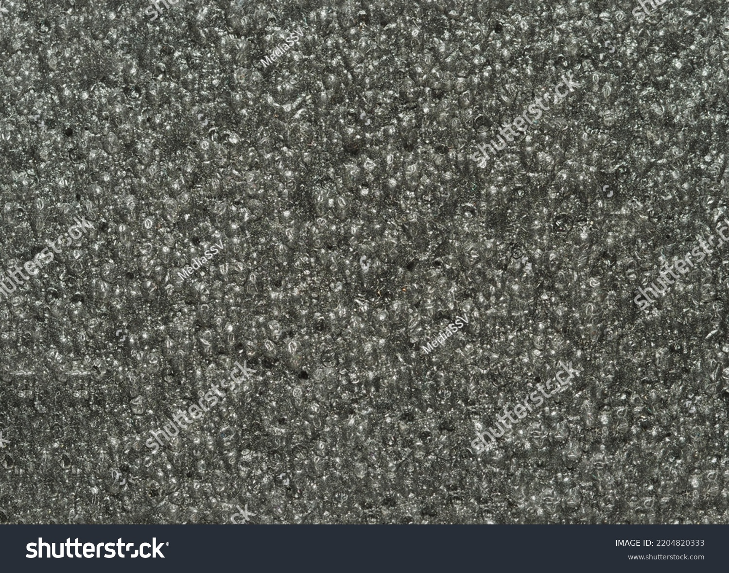 close up, background, texture, large long horizontal banner. surface structure black expanded polyethylene, EPE, padding cushioning material for packages. full depth of field. high resolution photo #2204820333