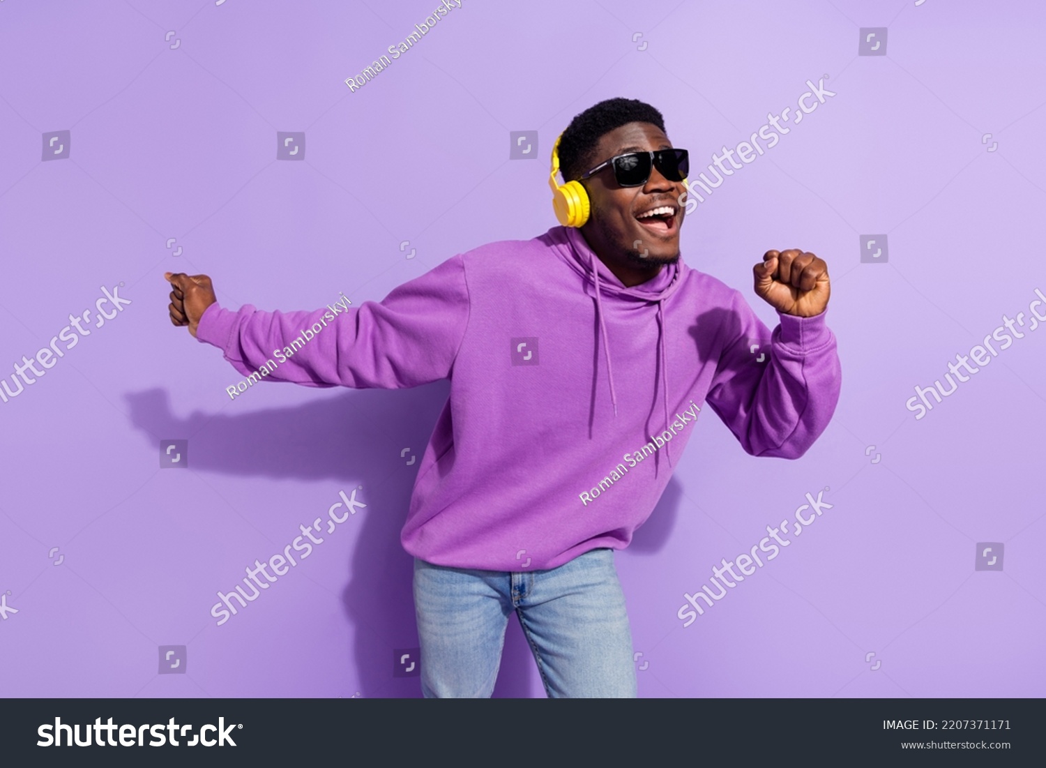 Photo of satisfied handsome person have fun chilling listen mp3 sound isolated on purple color background #2207371171