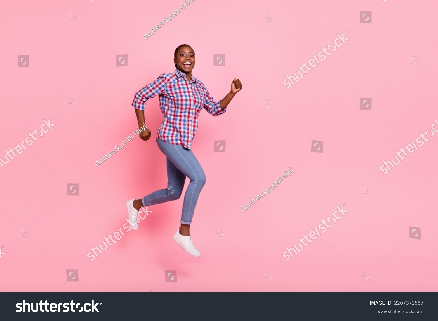 Full length profile portrait of pretty carefree person running jump empty space isolated on pink color background #2207371587