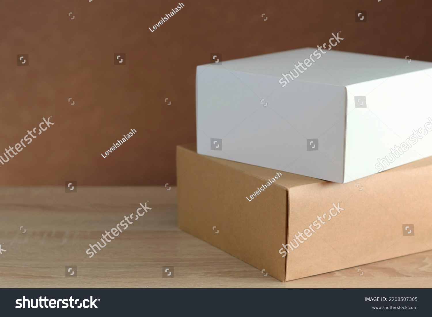 Boxes on a wooden surface, home delivery #2208507305