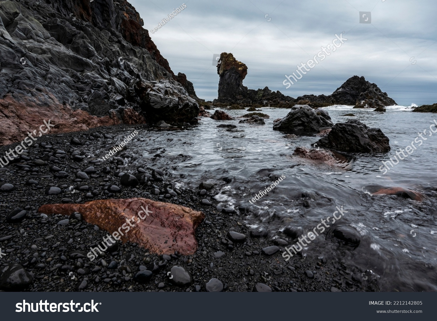 Bizarre black basalt rock formations and volcanic lava boulders in the surf on the shore of Djúpalónssandur beach, Snæfellsnes, Iceland #2212142805