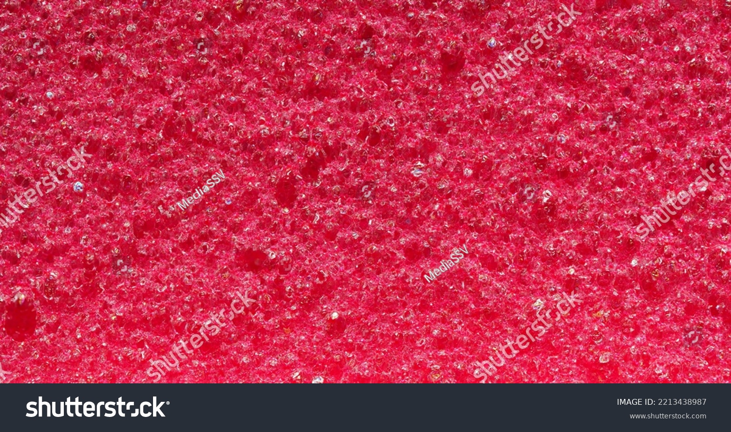 close-up, background, texture, large long horizontal banner. heterogeneous surface fine pore structure bright saturated red pumice stone for finger care. full depth of field. high resolution photo #2213438987