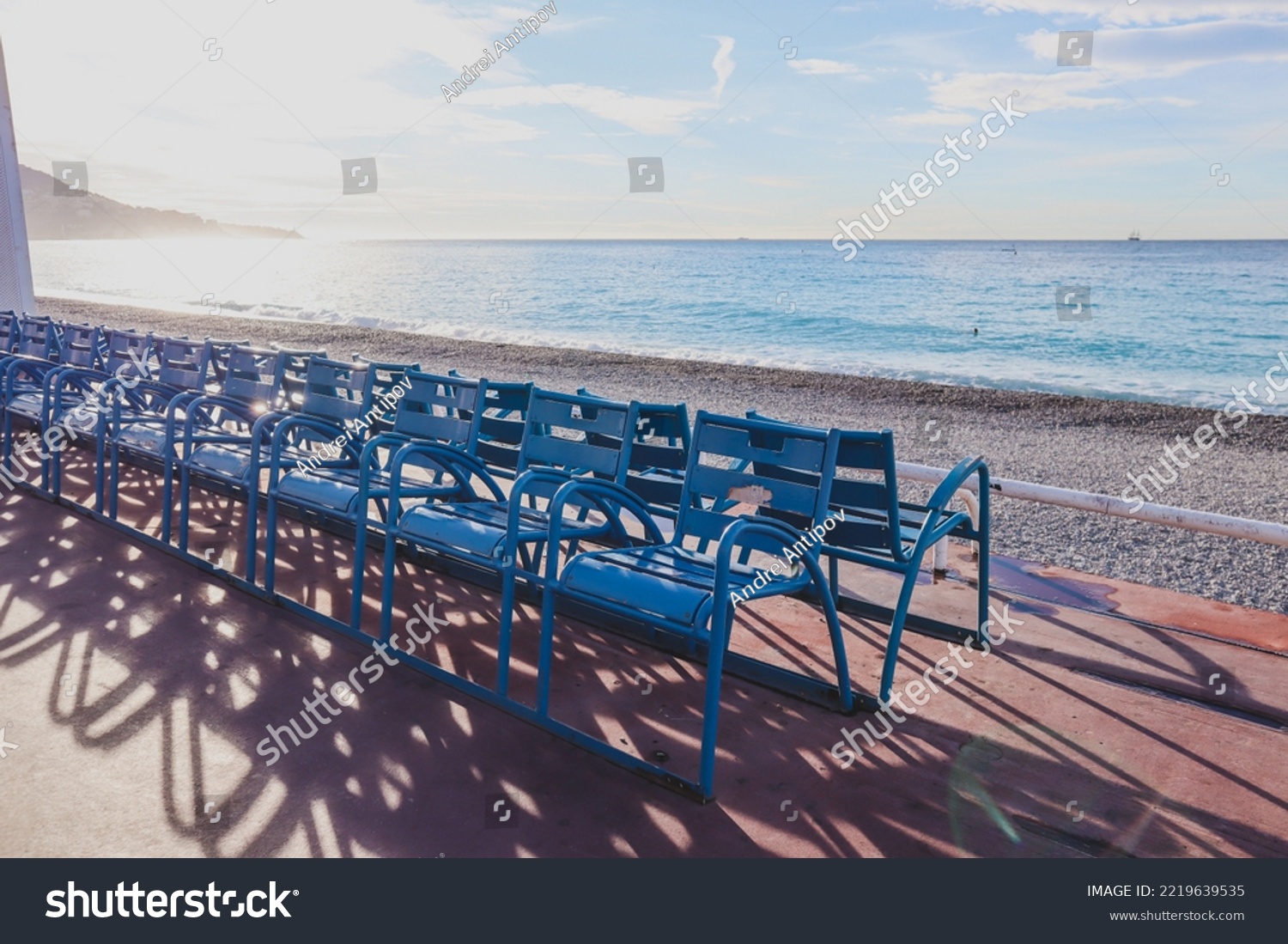 Famous blue chairs on the Promenade des Anglais in Nice #2219639535