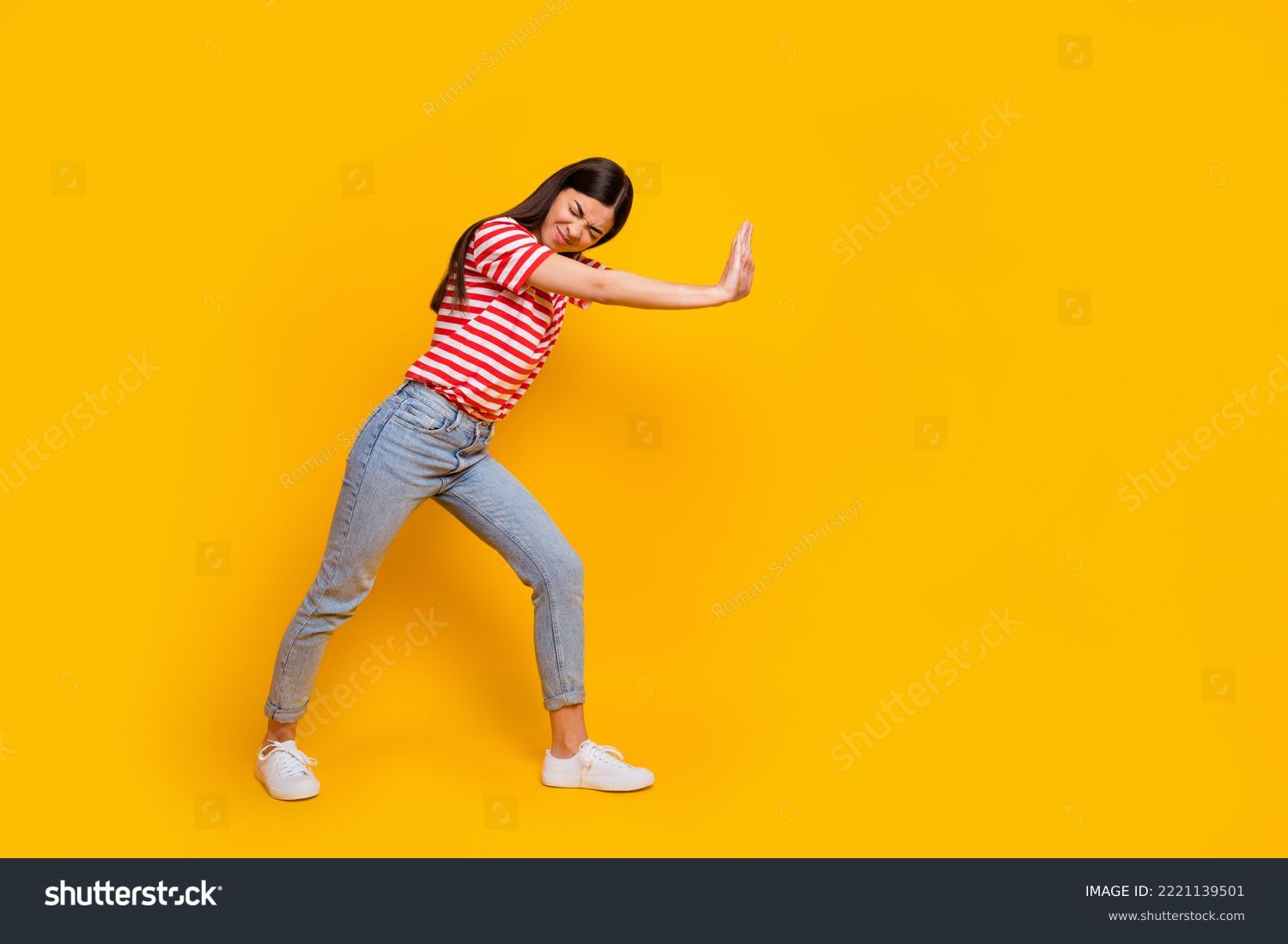 Full length profile portrait of hardworking pretty lady closed eyes arms push empty space isolated on yellow color background #2221139501