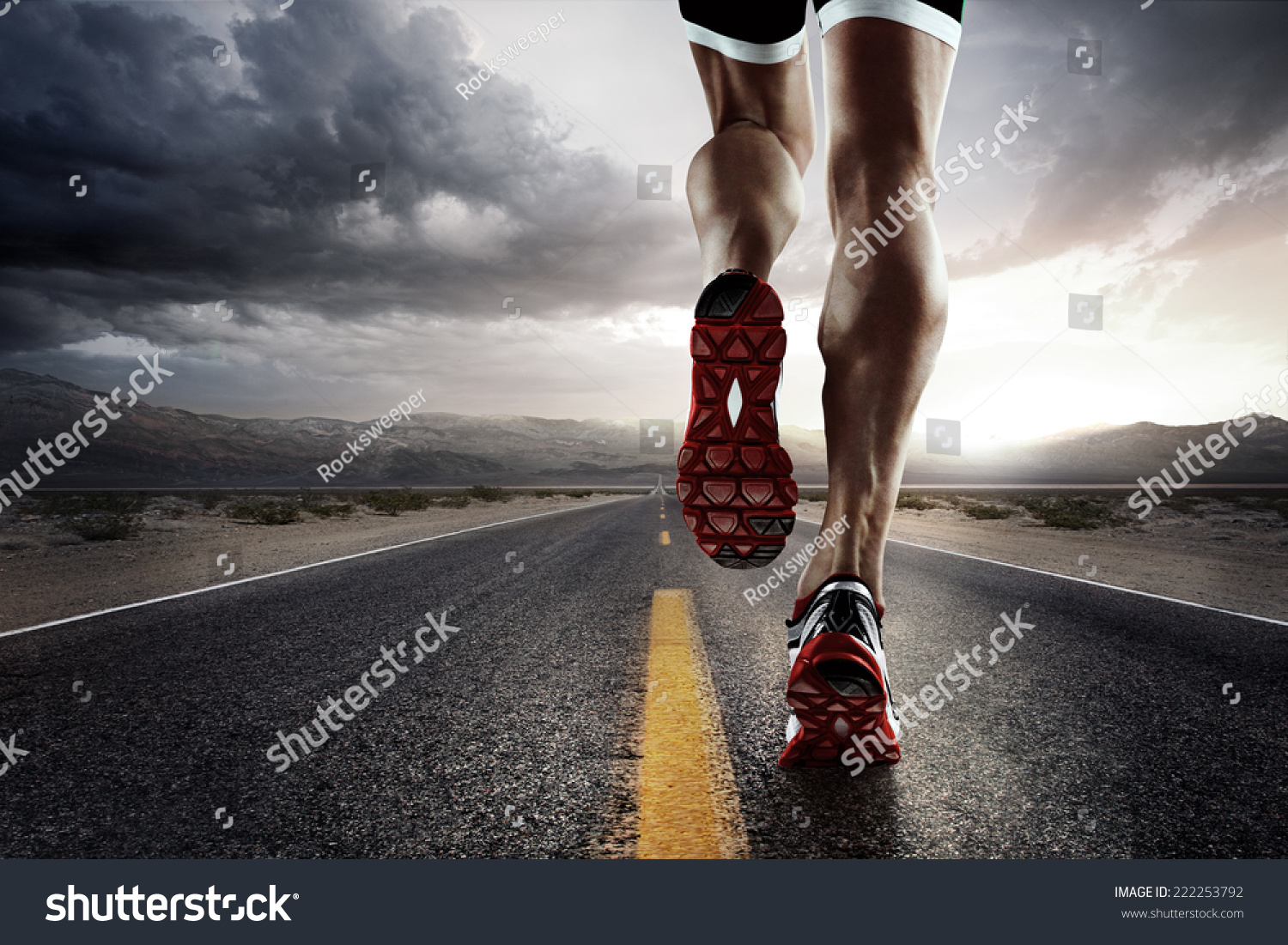 Sports background. Runner feet running on road closeup on shoe.  #222253792