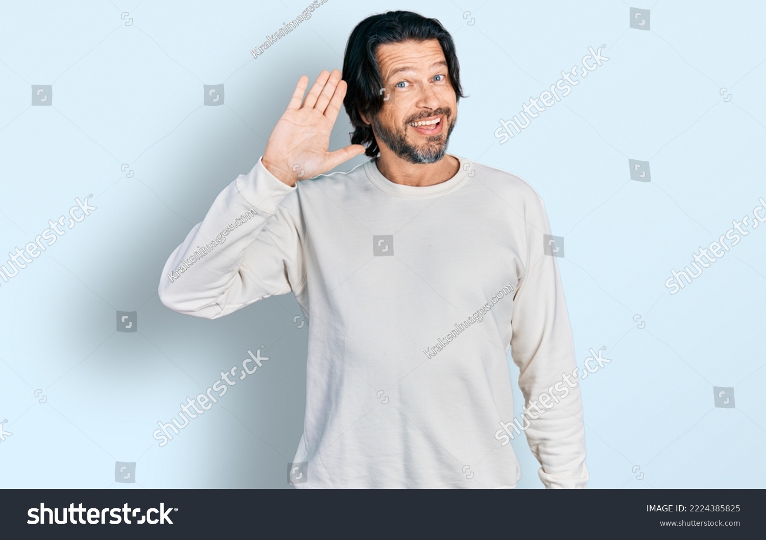 Middle age caucasian man wearing casual clothes waiving saying hello happy and smiling, friendly welcome gesture  #2224385825