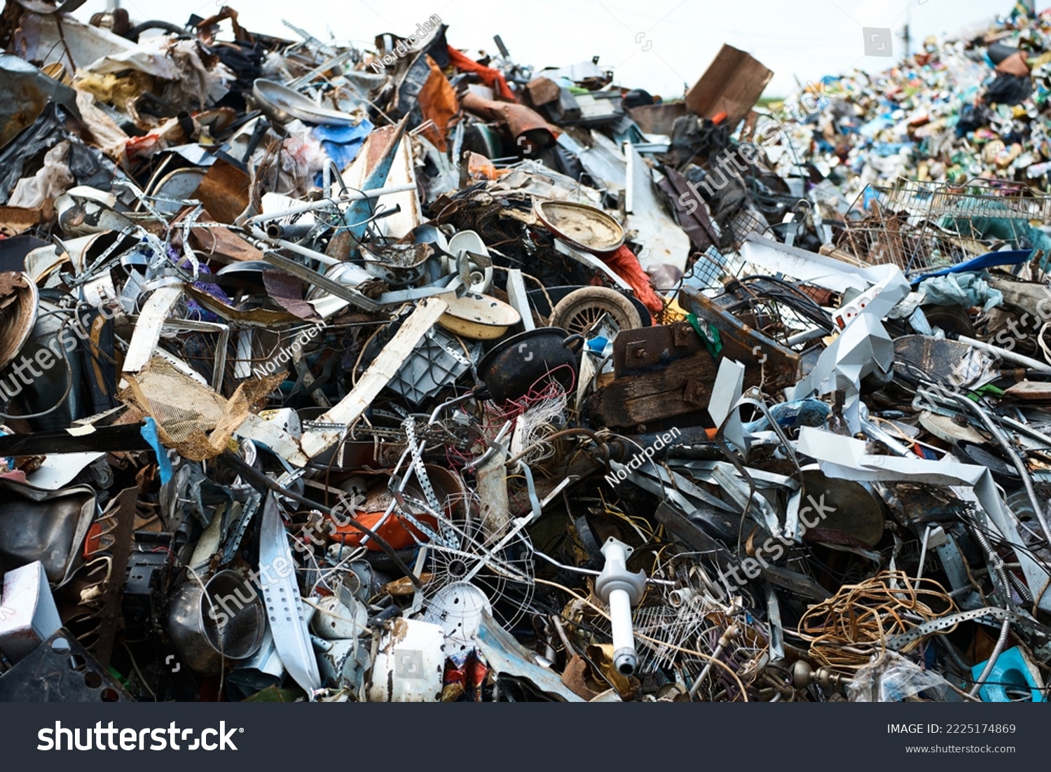 Huge pile of different waste items in recycling plant yard #2225174869