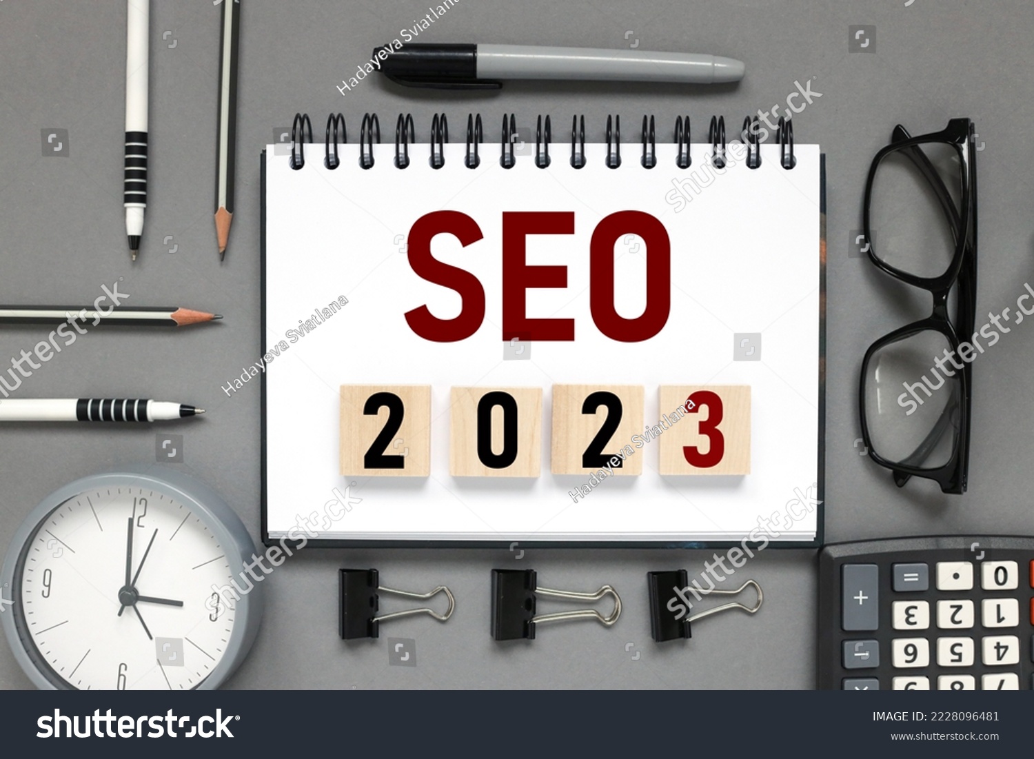 SEO 2023. text on a notebook and on wooden blocks. #2228096481