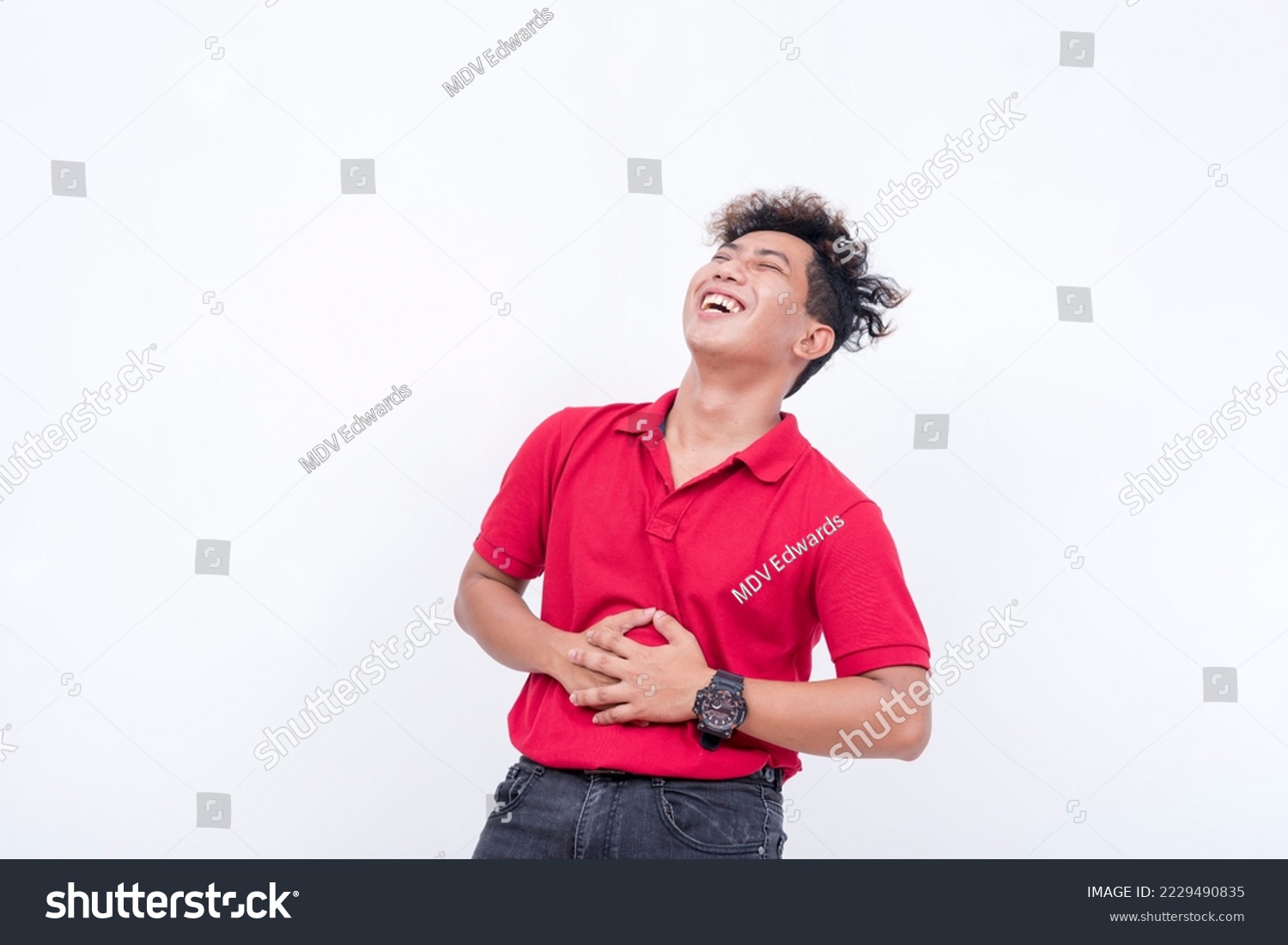 A man laughing intensely. A asian person having fun. Lighthearted scene isolated on a white background. #2229490835