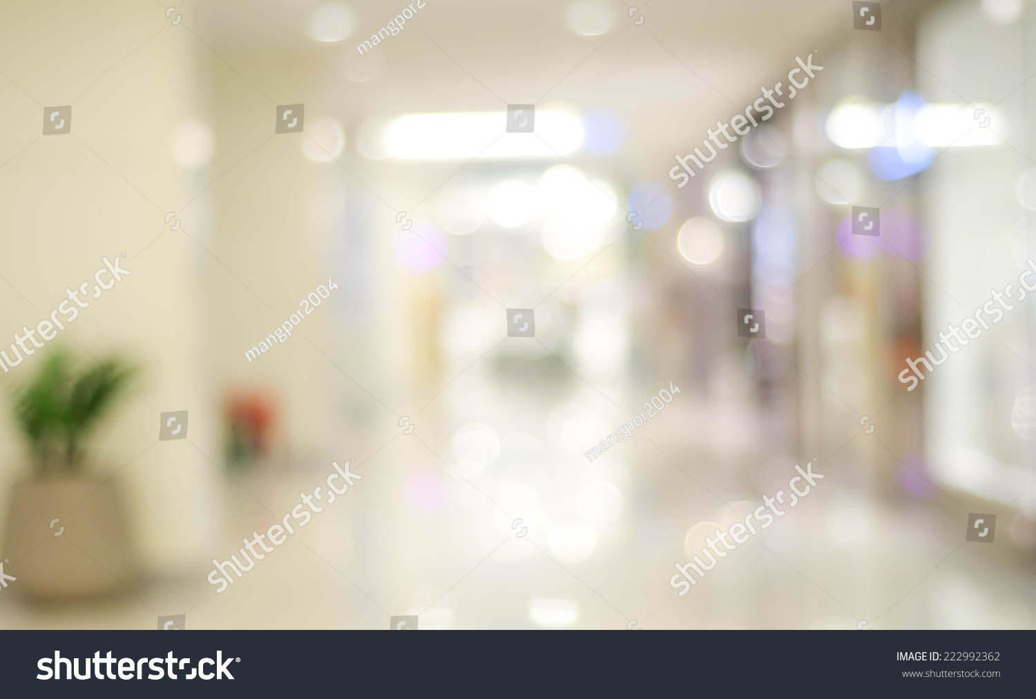 Blur light background at shop in mall for business background, blurry abstract bokeh at interior hallway #222992362