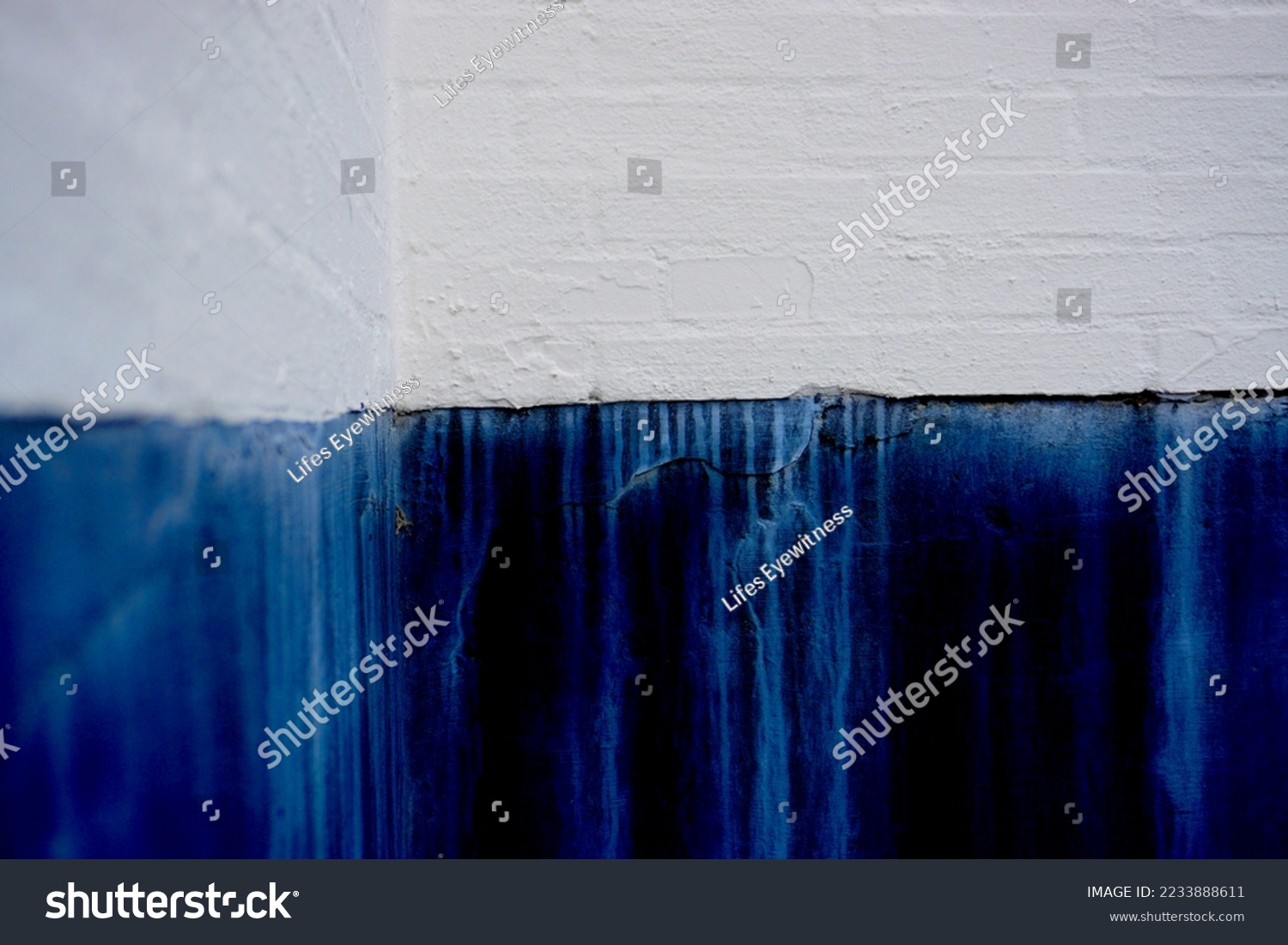 Running painting on wall caused by rain  #2233888611