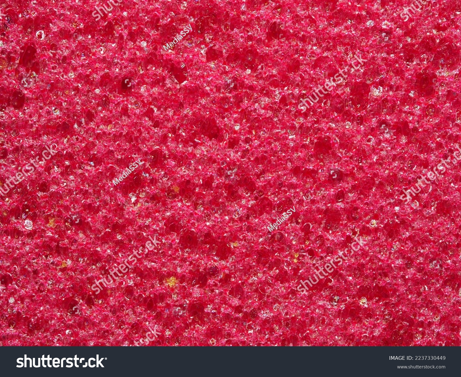 close-up, background, texture, large vertical banner. heterogeneous surface fine pore structure bright saturated red pumice stone for finger care. full depth of field. high resolution photo #2237330449