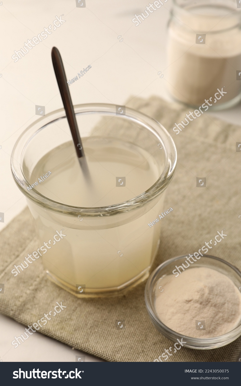 Agar-agar jelly and powder on white table, closeup #2243050075