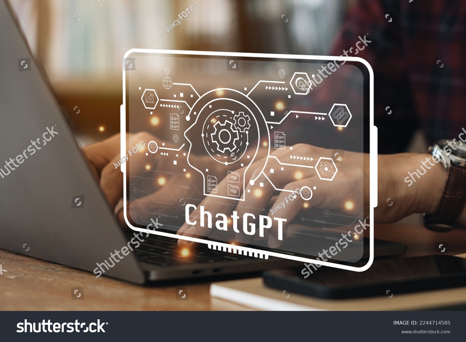ChatGPT Chat with AI or Artificial Intelligence. Young businessman chatting with a smart AI or artificial intelligence using an artificial intelligence chatbot developed by OpenAI. #2244714585