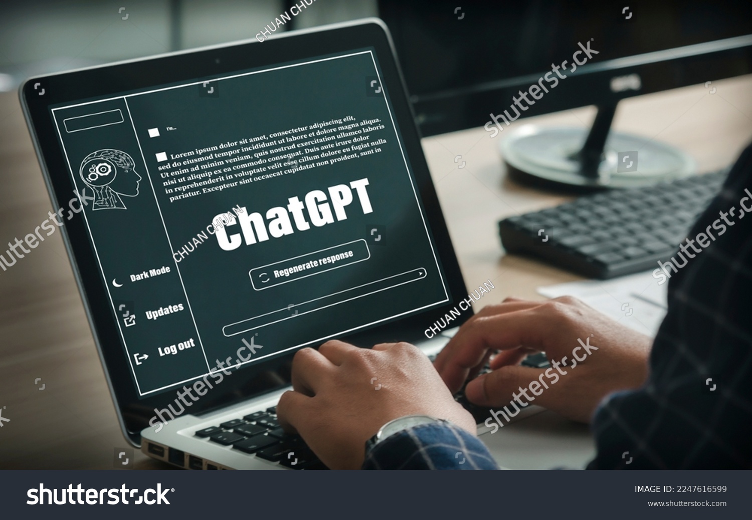 ChatGPT Chat with AI or Artificial Intelligence. Young businessman chatting with a smart AI or artificial intelligence using an artificial intelligence chatbot developed by OpenAI. #2247616599