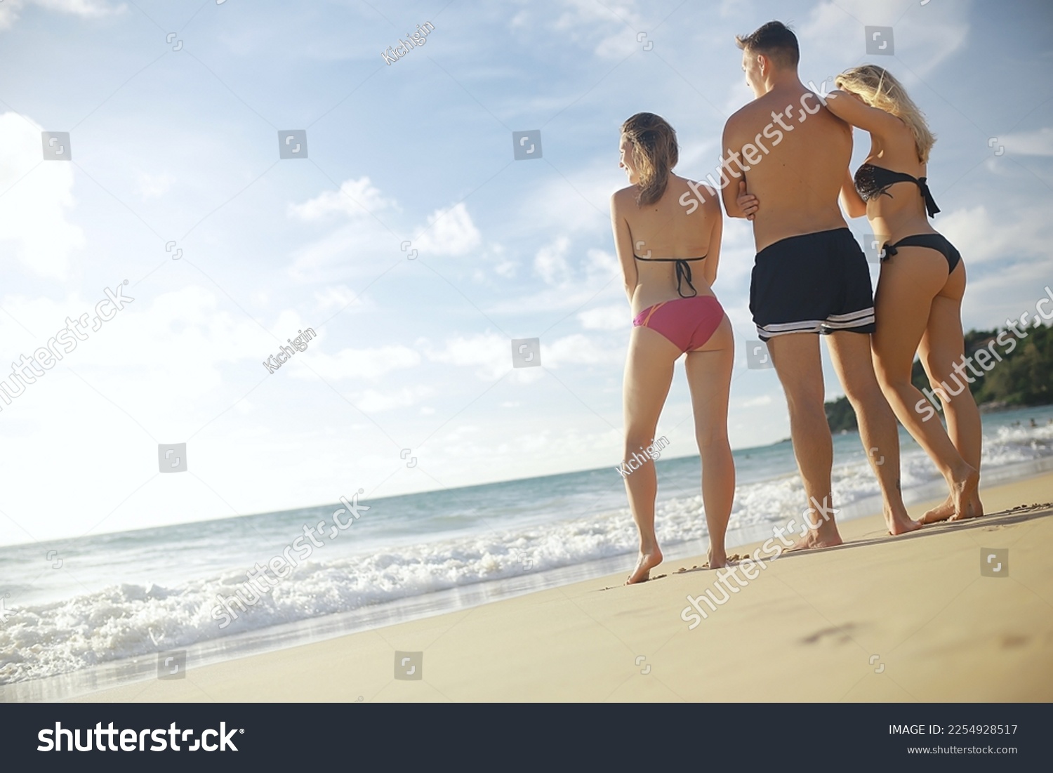group of happy friends relaxing by the sea #2254928517
