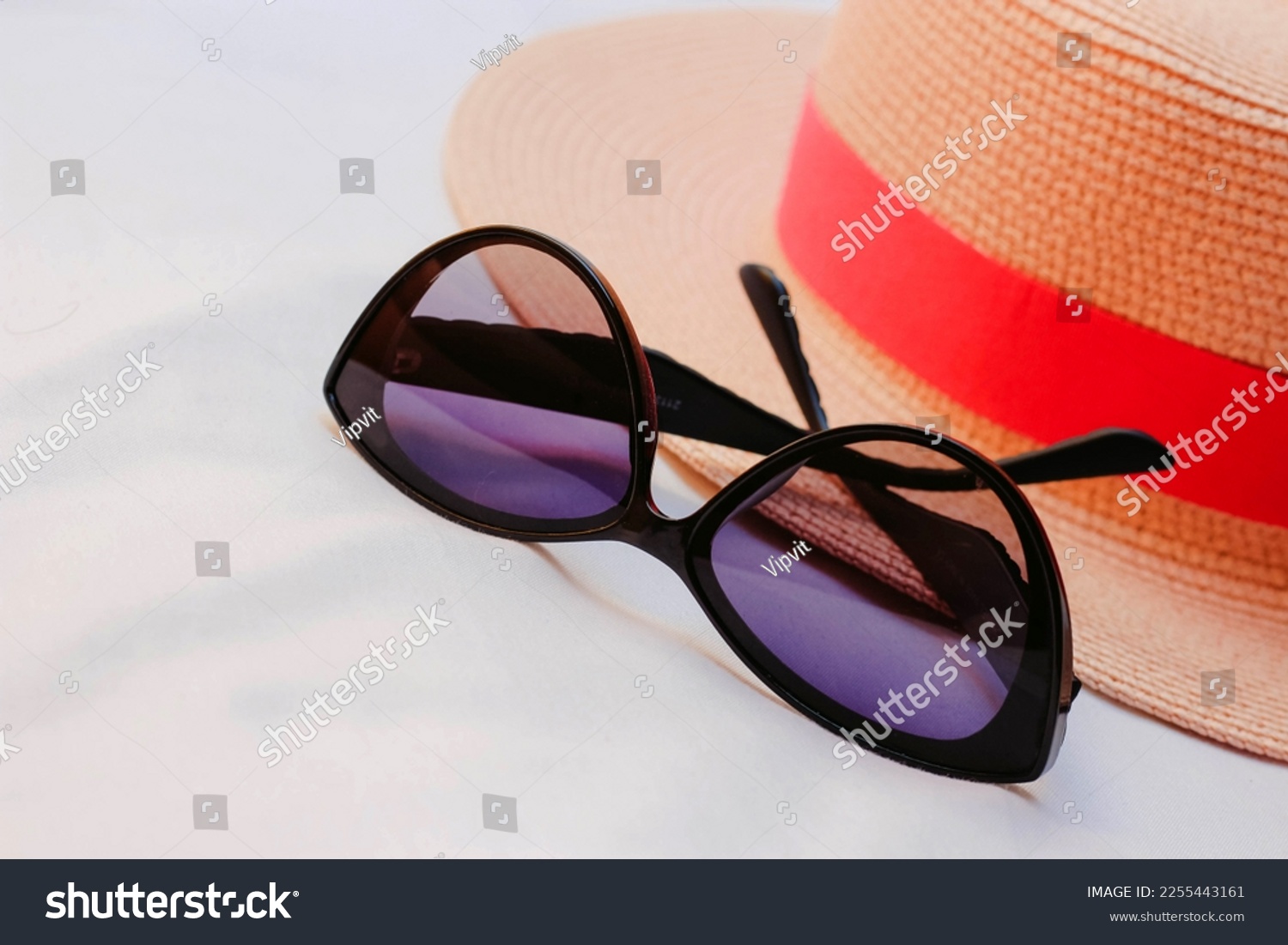 Women's Beach Hat and Sunglasses. Top View. #2255443161