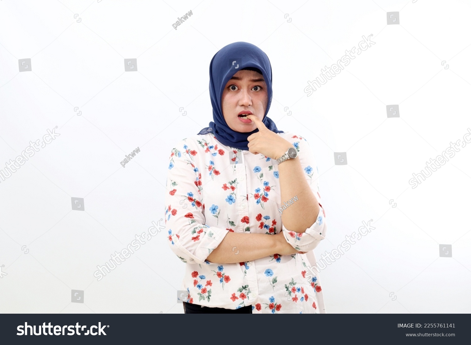 Stressed asian muslim woman standing with scared face expression. Isolated on white background #2255761141