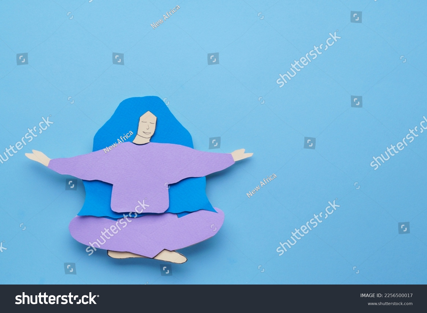 Woman paper figure on light blue background, top view. Space for text #2256500017