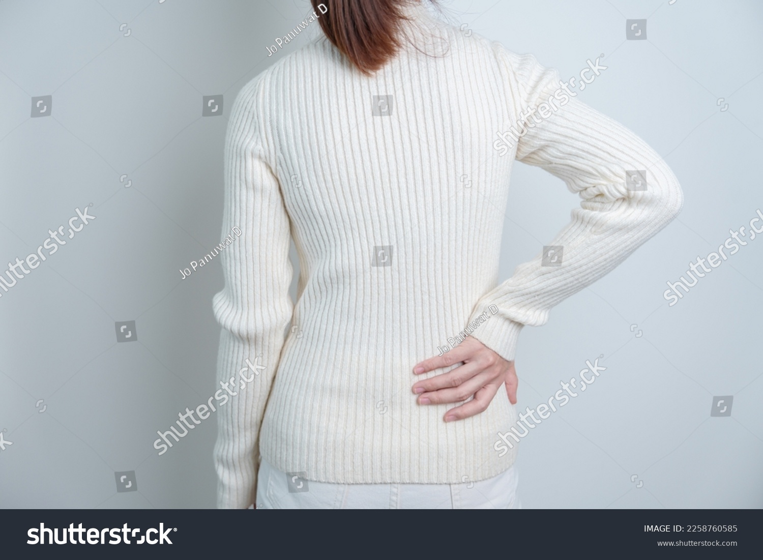 woman having back pain. Urinary system and Stones, Cancer, world kidney day, Chronic kidney stomach, liver pain and pancreas concept #2258760585